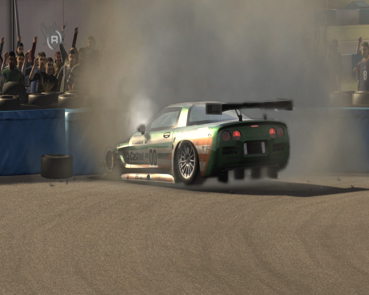A Corvette crashed into a tire wall courtesy of the author's terrible driving